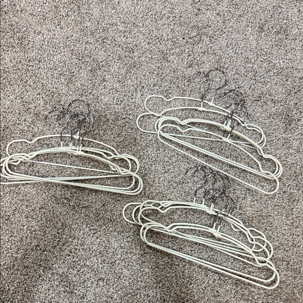 Set of White Metal Hangers 17 pieces